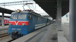 The tourist train Sochi – Gagra is at Adler railway station. Electric locomotive VL10