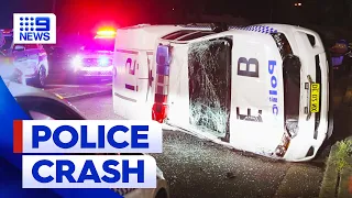 Officers escape major injury after police car rolls in Sydney | 9 News Australia