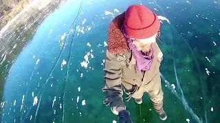 Russian man films mesmerizing walk across world's deepest frozen lake