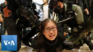 Hong Kong Police Pin Protesters to the Ground During Mall Protest