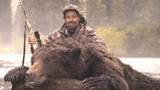 Aggressive Brown Bear stalks hunters within 7 Yards.