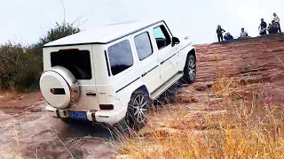 Mercedes G63 AMG 4.0l V8 Bi-Turbo vs Ford Range Raptor Team Challenge climbing a 30 degree slope