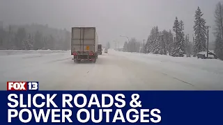 Snow causes power outages, slick roads near Snoqualmie Pass