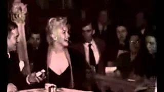 Marilyn Monroe and laurence olivier at feb 1956 press conference. footage