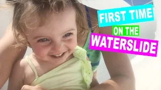 BABY'S FIRST TIME ON THE WATERSLIDE