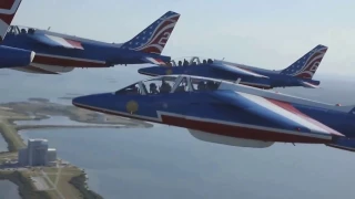 France Aerobatic team Patrouille de France fly by over Cap Canaveral