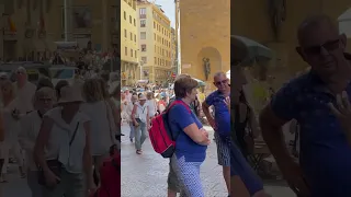 Walking Across the Ponte Vecchio in Florence Italy