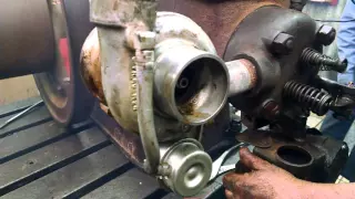 Running a turbo on a hit and miss motor.