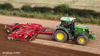 4Kᵁᴴᴰ John Deere JD 6215R cultivating with a Väderstad Carrier XL 525 near Rendlesham in Suffolk