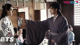 Behind the Scenes: Ah Xu is amused by Lao Wen's dance.