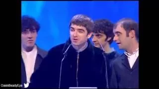 Oasis wins British Newcomer presented by Ray Davis at BRIT Awards 1995