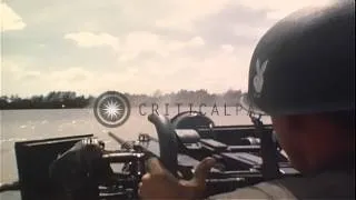 Crewmen fire M-60 and .50 caliber machine guns from a Patrol Boat River during Op...HD Stock Footage