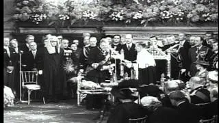 King Gustav VI and Queen Louise, of Sweden, arrive at Guildhall, London, where...HD Stock Footage