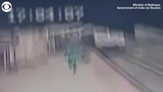 Railway worker saves child from train tracks, oncoming train