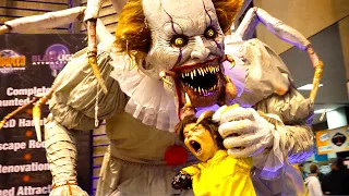 Creepy Clowns at Halloween Haunt Show with Giant Pennywise It