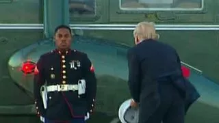 President Trump picks up Marine's hat in viral video