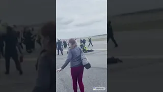 Emergency crew restrain passenger at NY Airport #shorts #nypd #newyork #airport