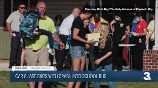 Car chase ends with crash into school bus