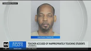 Teacher accused of touching students