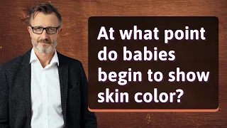 At what point do babies begin to show skin color?