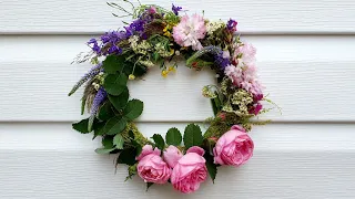 Wildflower wreath. Door wreath DIY Ecodecor. A wreath on the head of flowers. DIY