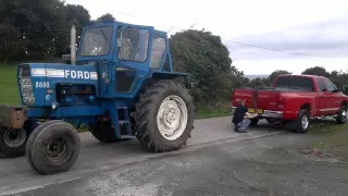 dodge ram cummins vs ford 8600 tractor tug of war