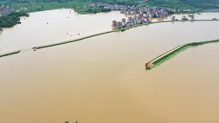 China raises flood response level to 2nd highest