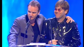 Elton John wins Outstanding Contribution presented by Sting | BRIT Awards 1995