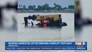 Woman Arrested After Driving Forklift Into Bay