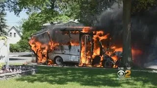 Woman Saved From Burning Bus