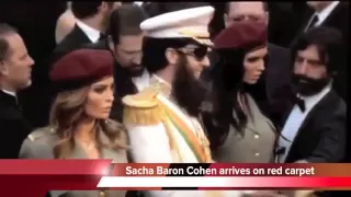 Oscars 2012 footage: Sacha Baron Cohen tips ashes over Ryan Seacrest