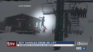 Crews rush to save little boy dangling from ski lift