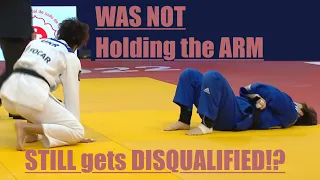 What!? Disqualified for attacking an arm she wasn't even holding!?