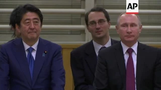 Raw: Putin Attends Judo Demonstration in Tokyo