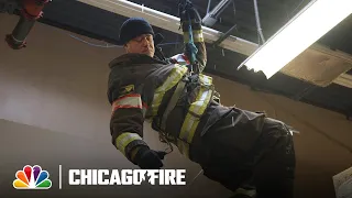 Severide Drops Through the Roof of a Hostage Scene | NBC’s Chicago Fire