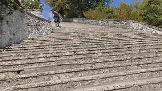 Carrying my wife up the 99 steps for our honeymoon - Lake Bled, Slovenia.