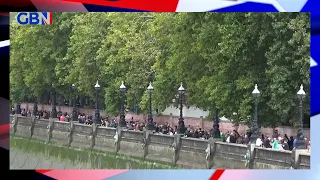 Queen Elizabeth II's coffin is 'adorned with the Royal Standard, the Orb and the Sceptre'