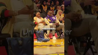 James runs up to Shannon Sharpe and hugs him after Lakers beat Hawks