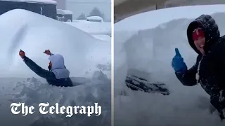 Canadians forced to dig through five feet of snow after blizzard hits Nova Scotia