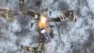 Ukrainian drone drops grenade to snowy trenches blow up Wagner Group russia in Bakhmut