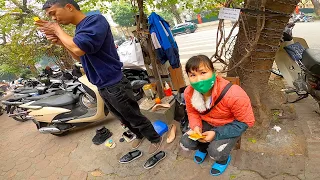 Hard working couple get pleasant surprise. Vietnam. Vợ chồng đánh giày.