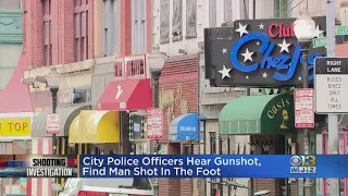 Fight over gun near Baltimore Police headquarters ends with gunshot injury