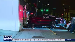 Two car crash, one hits building in Seattle | FOX 13 Seattle