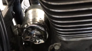How to remove a stuck oil filter on a motorcycle