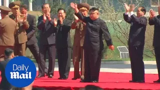 Rapturous reception for Kim Jong Un opening residental complex - Daily Mail