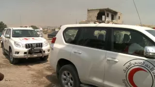 Raw: Syrian Evacuees Leave Daraya for Shelter