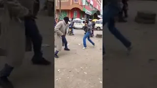 Two guys fight in Ghana market