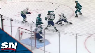 Luke Kunin Scores Bizarre Tip Off His Back To Tie Game vs. Canucks