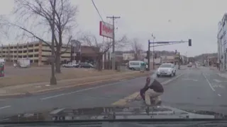 Dash cam catches child in car seat falling out of moving vehicle