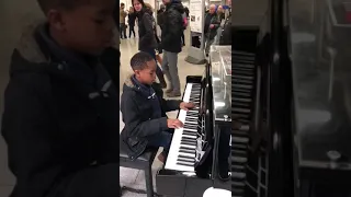 KID STRIKES AGAIN ON PUBLIC PIANO (river flows in you)